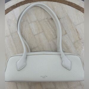 Alaia White Leather Shoulder Bag, elegant style, unique design, matching mirror